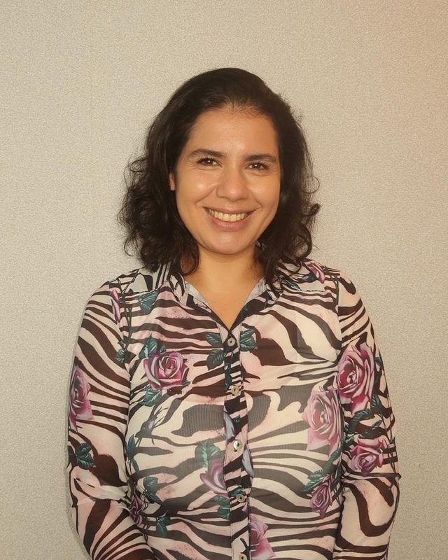 Roberta Alves de Oliveira smiling, portrait photo